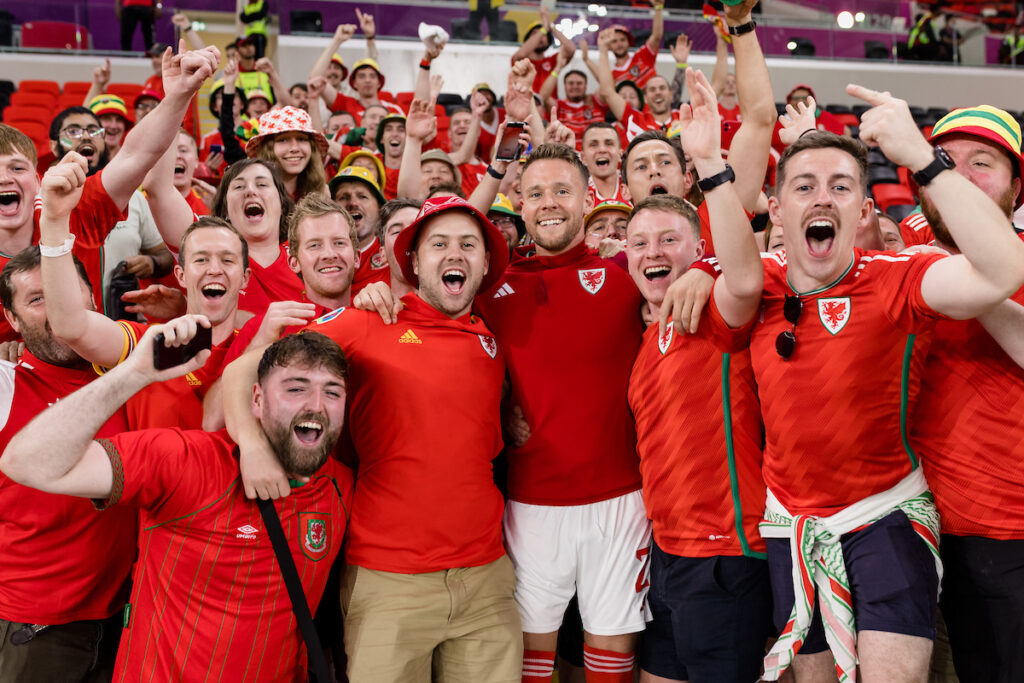 Chris Gunter poses for a picture in The Red Wall at the 2022 FIFA World Cup in Qatar.