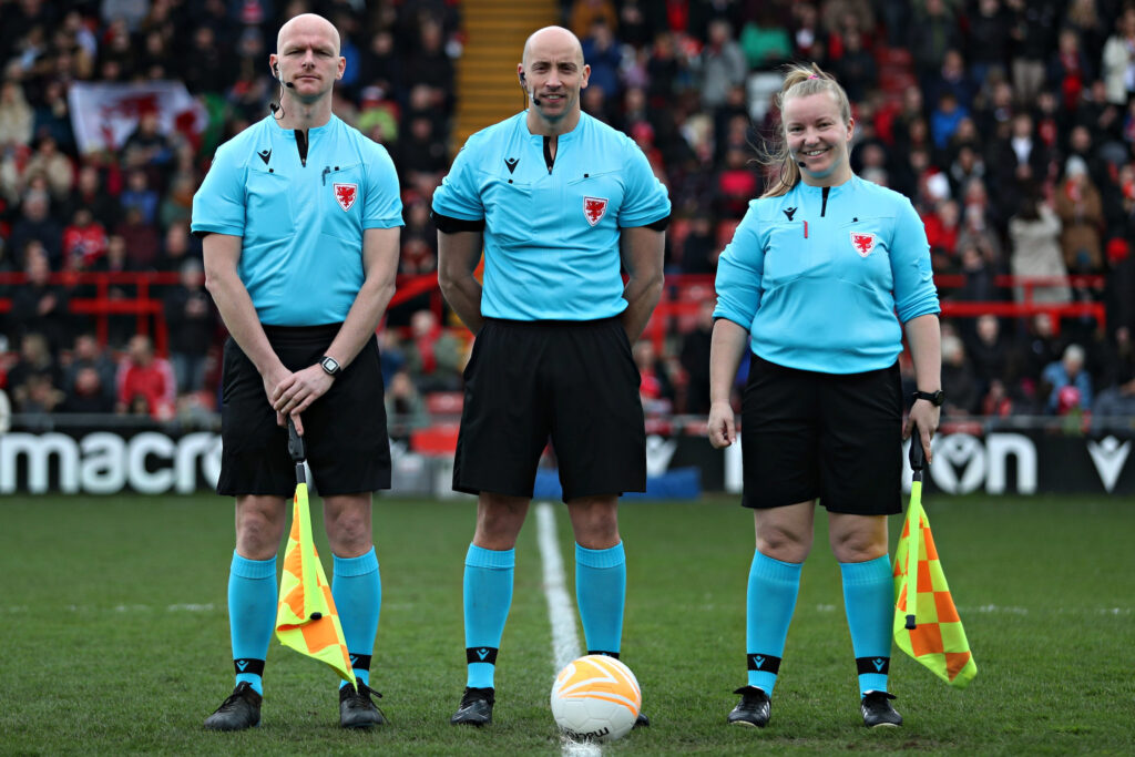 The match officials before Wrexham AFC Women vs Connah's Quay Nomads in the final game of the Genero Adran North at The Racecourse Ground, Wrexham