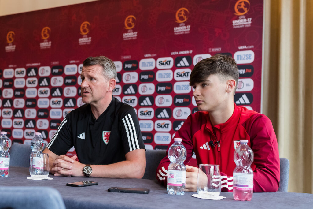 Wales Head Coach Craig Knight and Wales' Captain Charlie Crew during a Uefa media session prior to the 2023 UEFA  European Under-17 Championship Group A fixture between Hungary & Cymru at the Hidegkuti Nandor Stadium, Budapest, Hungary