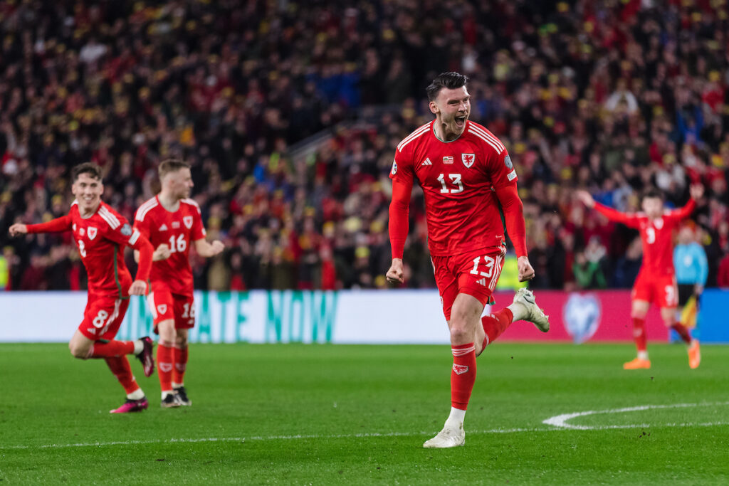 Kiefer Moore celebrates the winning goal against Armenia