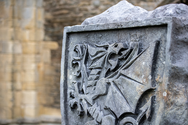 Monolith stone with the emblem of the Football Association of Wales