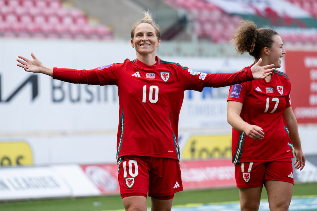 Jess Fishlock celebrates scoring for Cymru against Kosovo. 