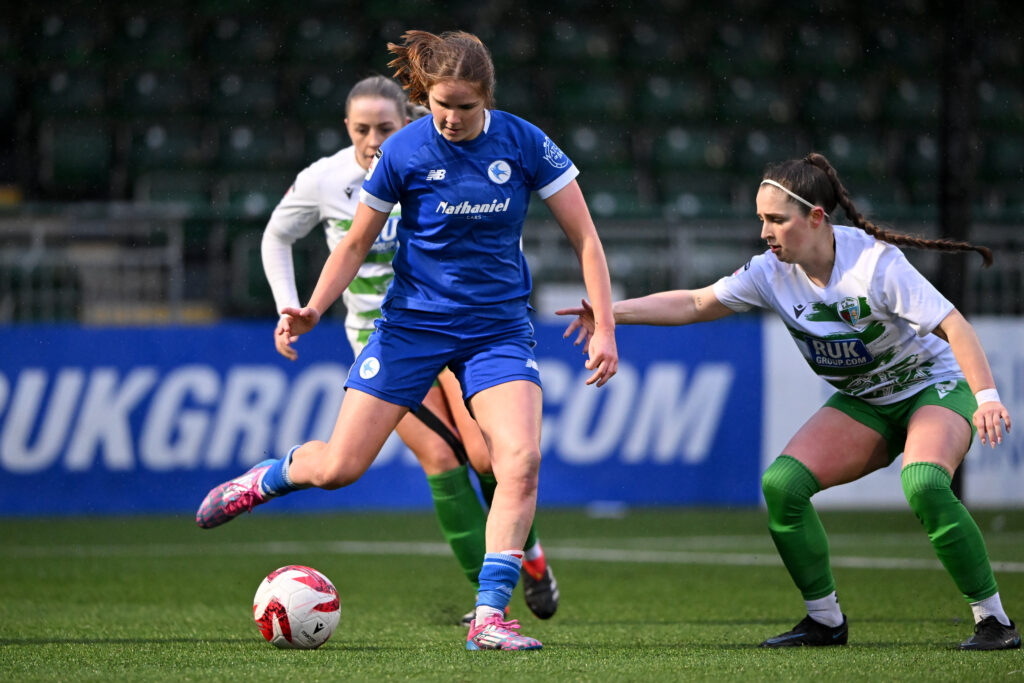 Fiona Barry of Cardiff City Women under pressure from Tiggy Webb of TNS Women in the Genero Adran Premier fixture between The New Saints FC Women and Cardiff City Women FC at Park Hall Stadium in Oswestry, England.