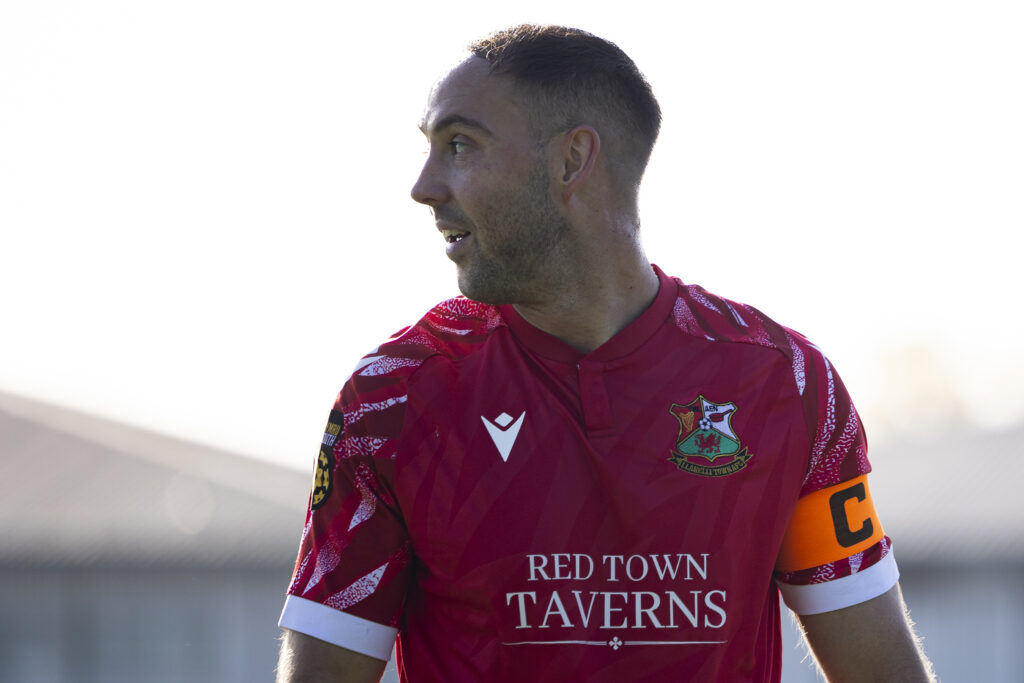 Joe Hopkins of Llanelli Town in action. Clwb Cymric v Llanelli Town in the JD Welsh Cup at Ocean Park Arena on the 19th October 2024