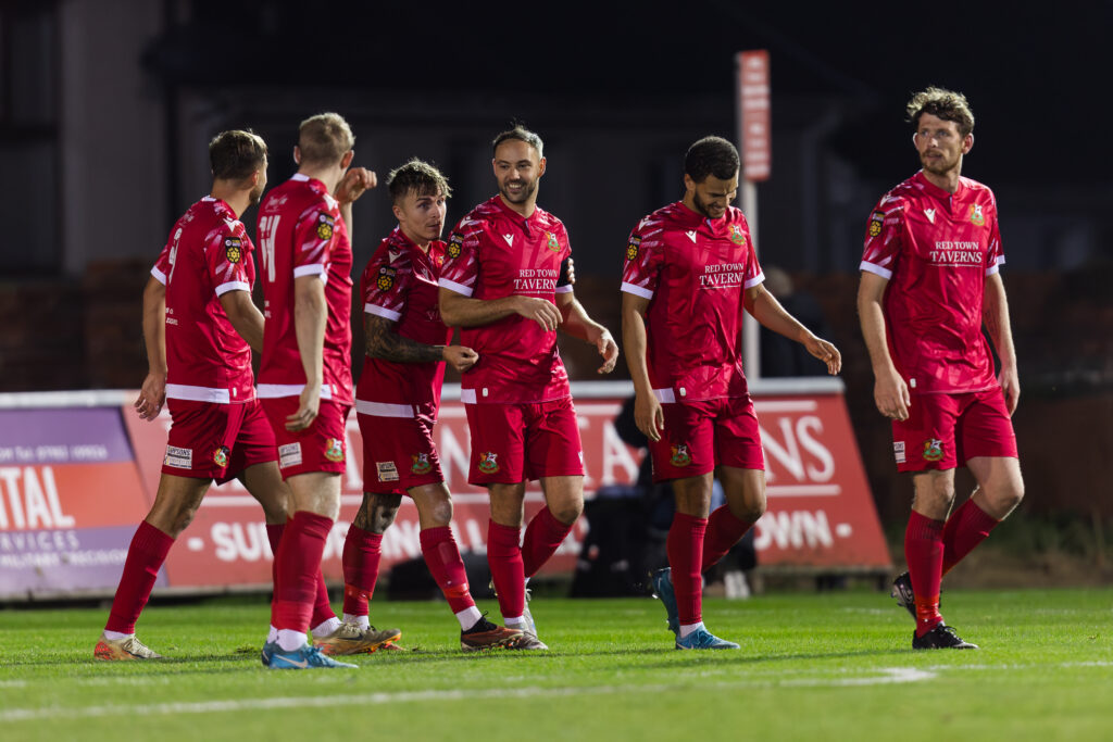 Llanelli's Joe Hopkins scores and celebrates during the 2024/25 JD Cymru South fixture between Llanelli Town AFC and Penrhiwceiber Rangers AFC, Stebonheath Park, Llanelli