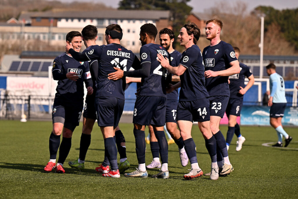 Adrian Cieslewicz of The New Saints F.C. celebrates scoring his sides second goal in the FAW Welsh Cup Semi Final Match between Cambrian United and The New Saints at Park Avenue in Aberystwyth, Wales.