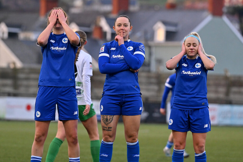 Fiona Barry of Cardiff City Women celebrates scoring her sides first goal with Laura Curnock of Cardiff City Women  and Kerry Walklett of Cardiff City Women in the Bute Energy Welsh Cup Semi Final Match between The New Saints Women and Cardiff City Women at Park Avenue in Aberystwyth, Wales