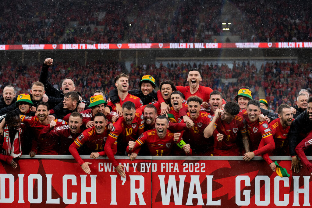 Cymru players celebrate at full time during the 2022 FIFA World Cup play-off final between Wales and Ukraine at the Cardiff City Stadium on the 5th of June 2022