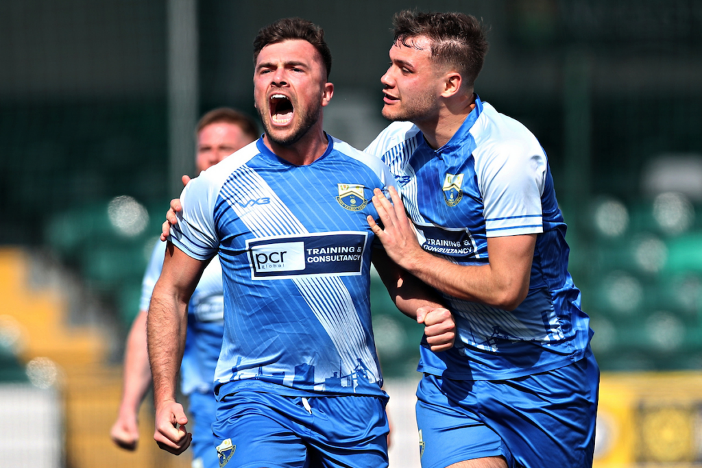 Port Talbot Town players celebrate after scoring in the semi-final of the FAW Dragon Signs Amateur Trophy against Trearddur Bay.