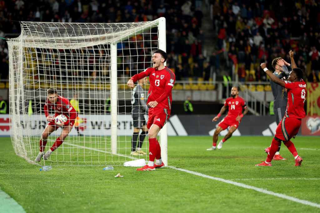 Cymru's David Brooks celebrates scoring his sides equaling goal to make the score 1-1 with team mate Wales' Kieffer Moore and Wales' Rabbi Matondo during the 2026 FIFA World Cup qualifying group J fixture against North Macedonia