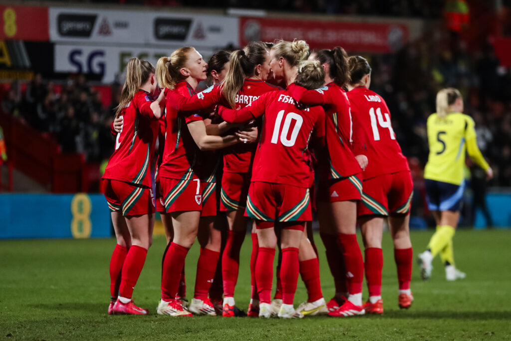 Cymru's Kayleigh Barton scores from the penalty spot and celebrates 1-1 during the UEFA Women’s Nations League, Group A4 match between Wales and Sweden at the STōK Cae Ras in Wrexham on the 25th February 2025