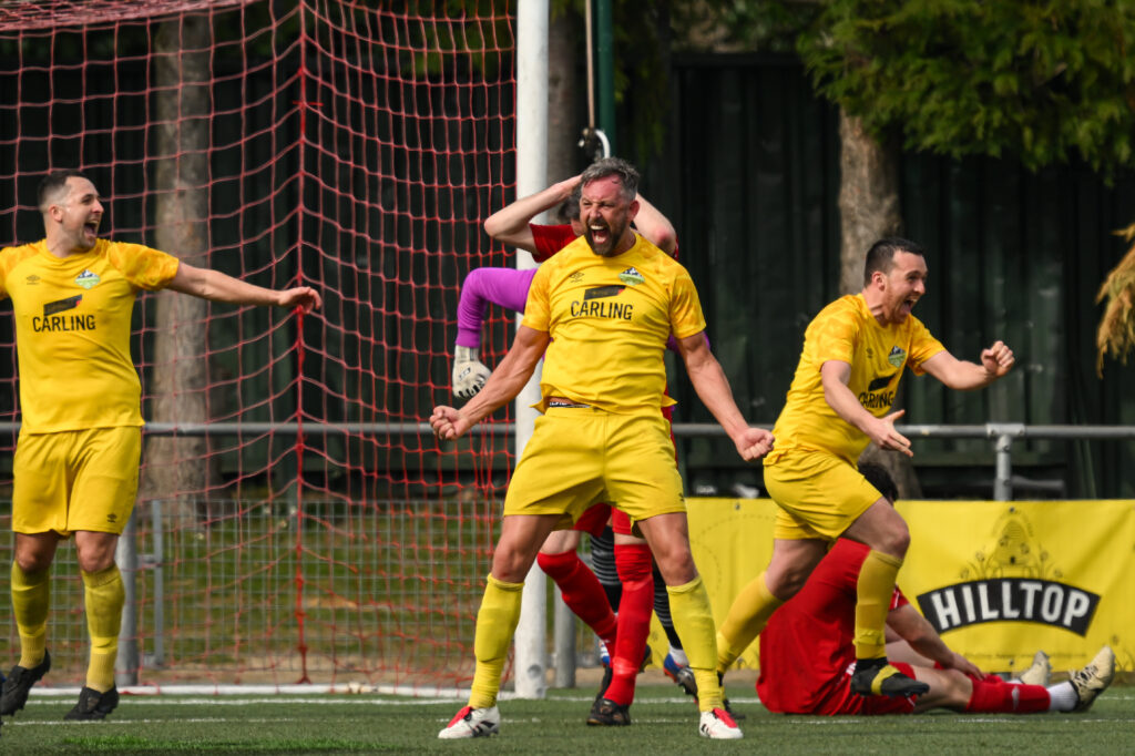 Mark Crutch of Penygraig United celebrates winning the Dragon Signs Amateur Trophy 2024/25 Semi-Final fixture between Penygraig United v Llanrwst United at Latham Park, Newtown, Wales