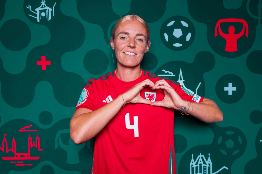 Sophie Ingle poses in a Cymru shirt during a EURO 2025 media day