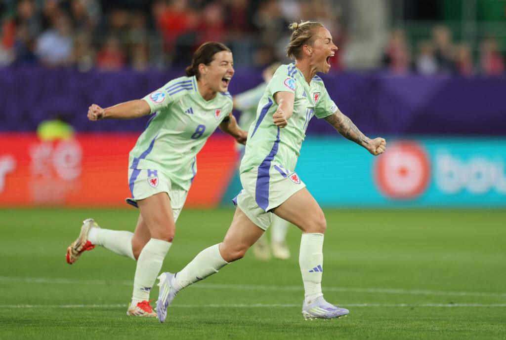 Jess Fishlock of Wales celebrates scoring for Cymru against France.