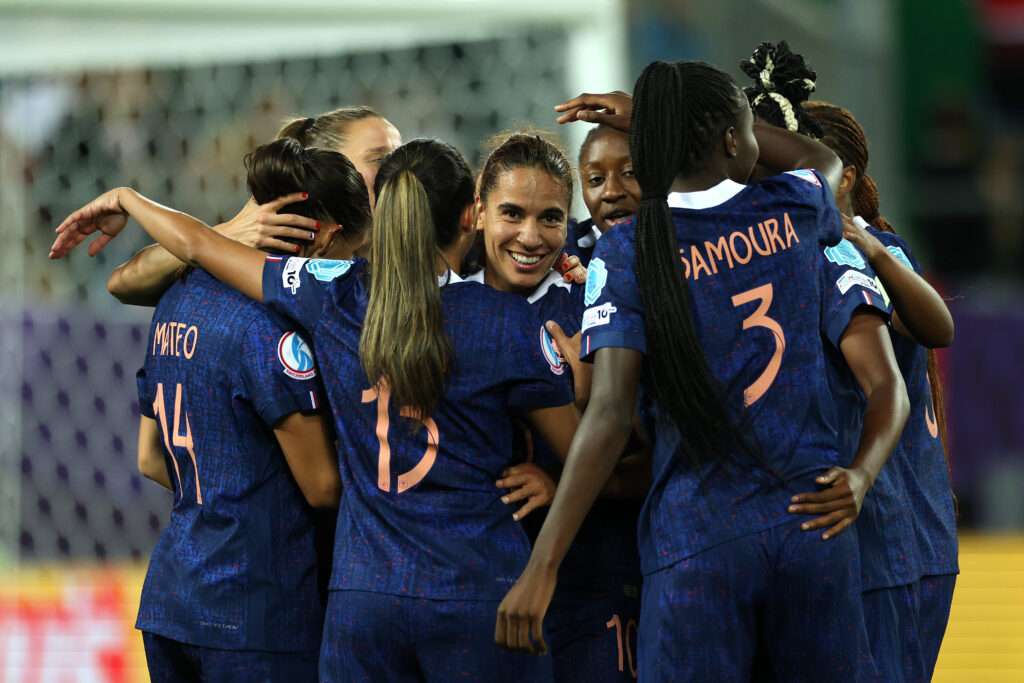 Amel Majri celebrates scoring France's third goal