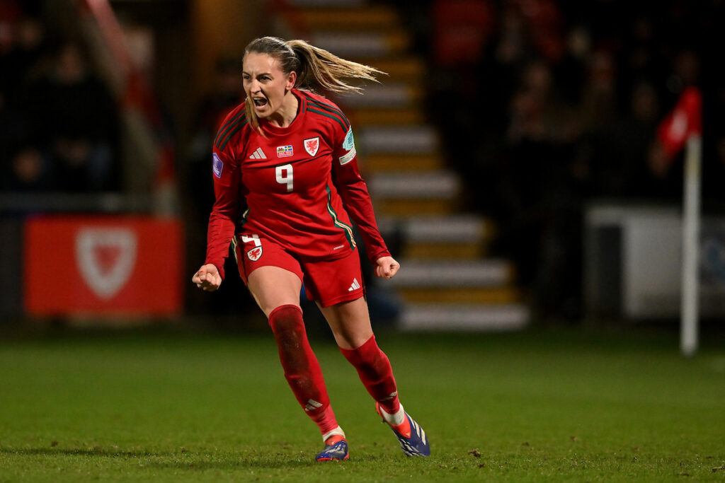 Kayleigh Barton celebrates scoring for Cymru against Sweden in the UEFA Nation's League. 