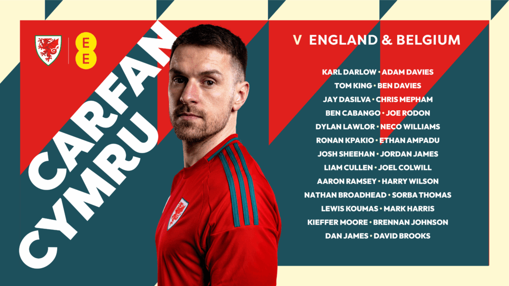 CARFAN CYMRU TEXT along with a photo of Aaron Ramsey, accompanied with text which is the Wales squad; Karl DARLOW (Leeds United), Adam DAVIES (Sheffield United), Tom KING (Everton), Ben DAVIES (Tottenham Hotspur), Jay DASILVA (Coventry City), Chris MEPHAM (West Bromwich Albion), Ben CABANGO (Swansea City), Joe RODON (Leeds United), Dylan LAWLOR (Cardiff City), Neco WILLIAMS (Nottingham Forest), Ronan KPAKIO (Cardiff City), Ethan AMPADU (Leeds United), Josh SHEEHAN (Bolton Wanderers), Jordan JAMES (Leicester City, on loan from Stade Rennais), Liam CULLEN (Swansea City), Joel COLWILL (Cardiff City), Harry WILSON (FULHAM), Nathan BROADHEAD (Wrexham), Sorba THOMAS (Stoke City), Lewis KOUMAS (Birmingham City, on loan from Liverpool), Mark HARRIS (Oxford United), Kieffer MOORE (Wrexham), Aaron RAMSEY (Pumas UNAM), Brennan JOHNSON (Tottenham Hotspur), Daniel JAMES (Leeds United), David BROOKS (Bournemouth).
