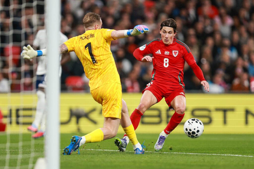 Harry Wilson has a rare goalscoring chance for Wales as Jordan Pickford makes the save for England at Wembley Stadium.