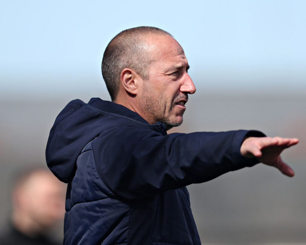 Port Talbot Town coach Robert Cockings giving instructions