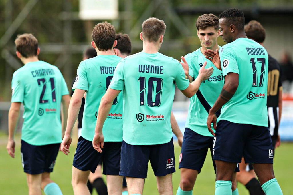 Ben Wynne of Flint Town United celebrates his goal during Bow Street FC vs Flint Town United in Round 2 of the JD Welsh Cup at Cae Piod, Bow Street