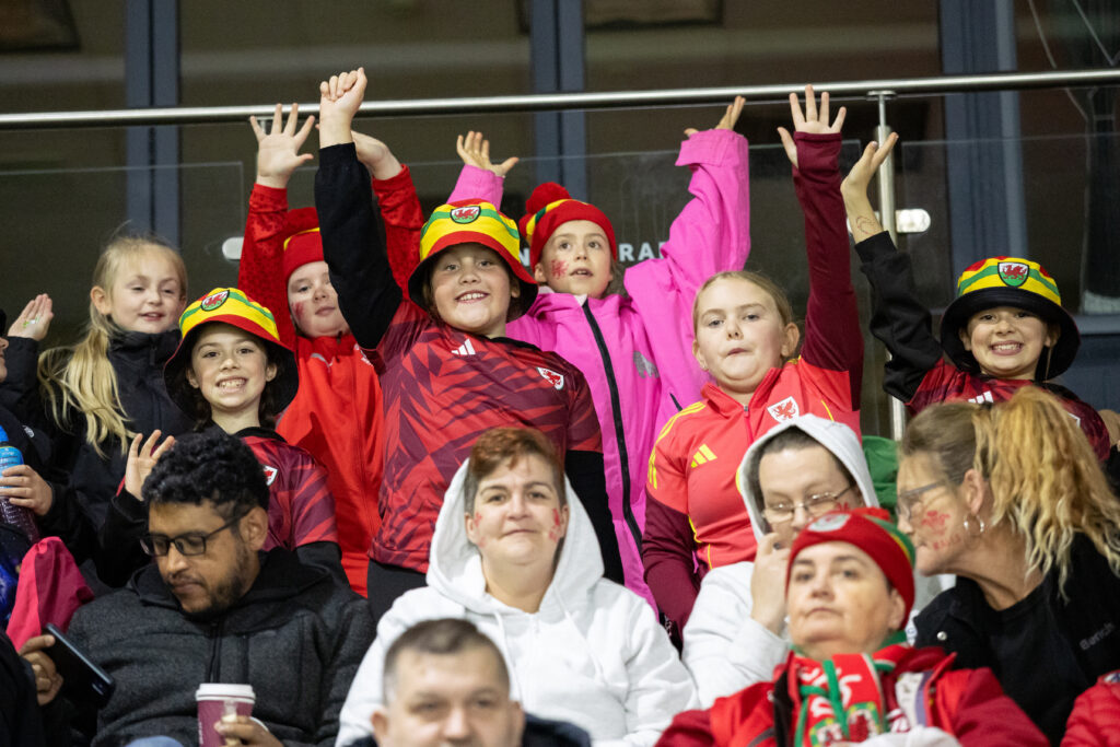 Supporters of Wales during the international Friendly fixture between Wales and Poland at the Rodney Parade in Newport on the 28th October 2025