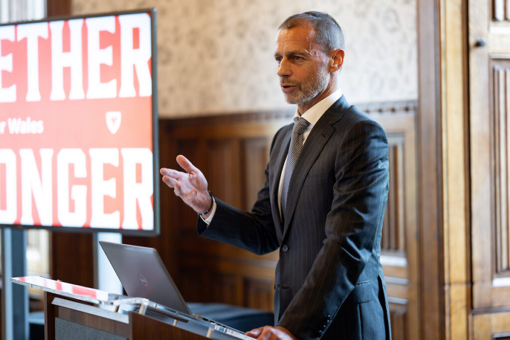 Aleksander Čeferin addresses the FAW delegation at Hensol Castle. 