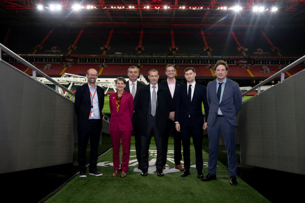 Gavin Marshall (WRU Chief Operating Officer), Laura McAllister (UEFA Vice President), Zoran Laković (UEFA National Associations Director), Aleksander Čeferin (UEFA President), Alex Luff (Head of Event Sales and Operations), Ben Davies (Cymru Captain) and Noel Mooney (FAW Chief Executive) at The National Stadium of Wales in Cardiff. 