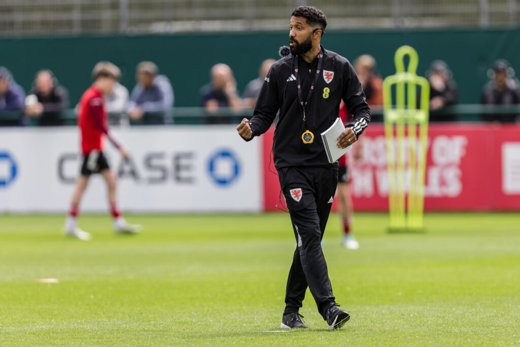 Caen head coach Gael Clichy conducting a session at the National Coaches Conference in Newport. 